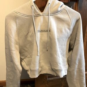 Alphalete crop sweatshirt. Size small. Brand new!
